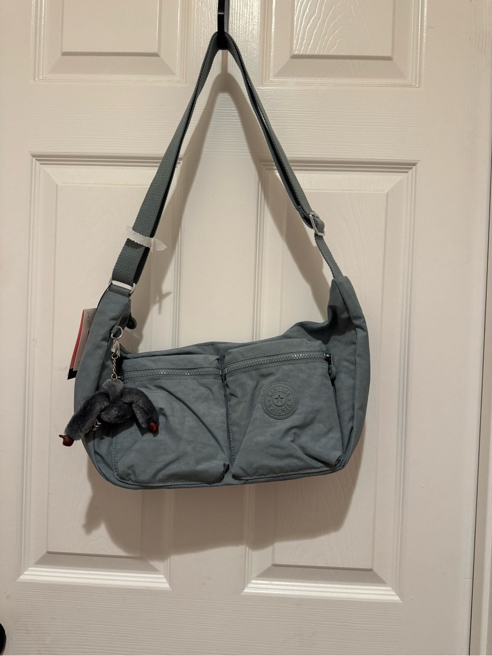 Kipling Jericho Crossbody Bag in Relaxed Grey in signature nylon with Stevie